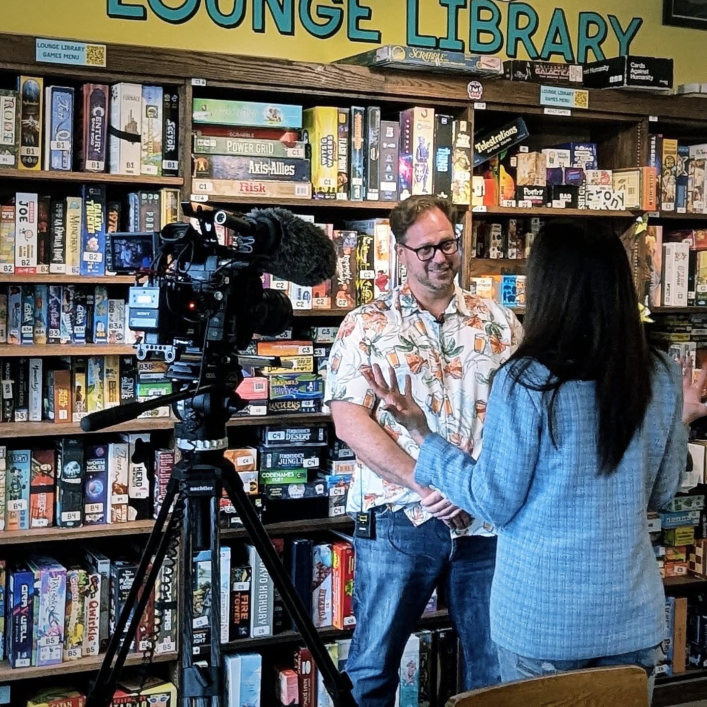 Man standing in front of games